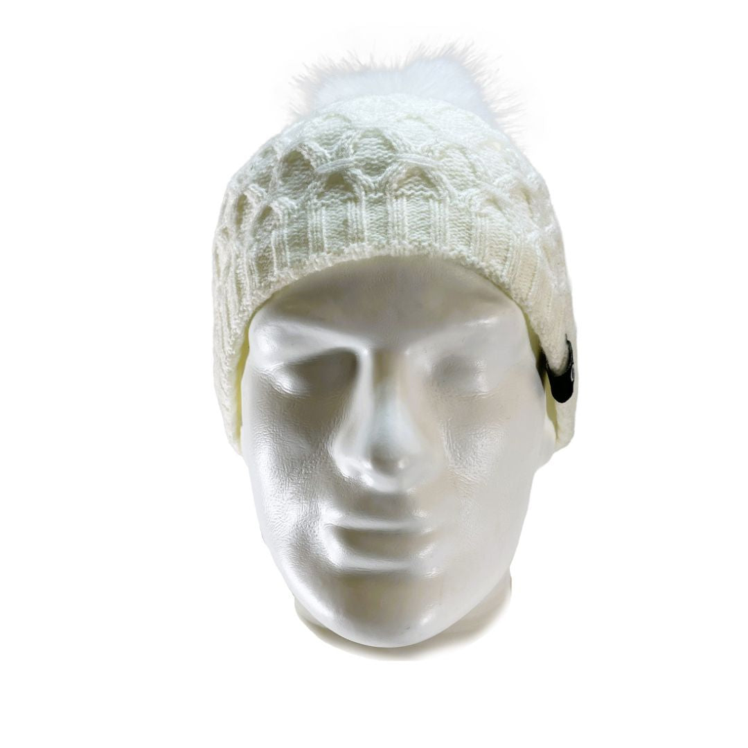 Side view of Domex Honeycomb-knit cuffless beanie with fluffy faux fur accent pom pom - white